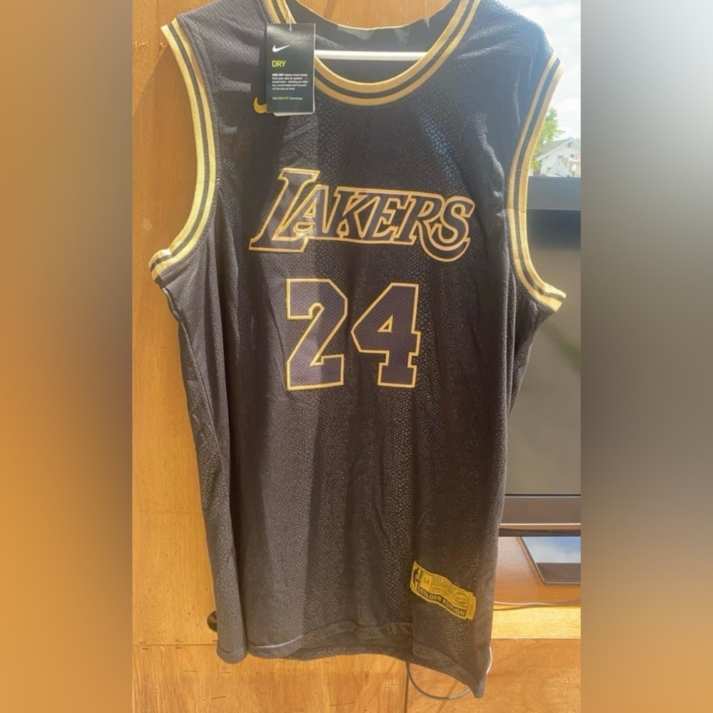 NWT RARE Kobe Bryant Black and gold Mamba jersey 
Gold edition